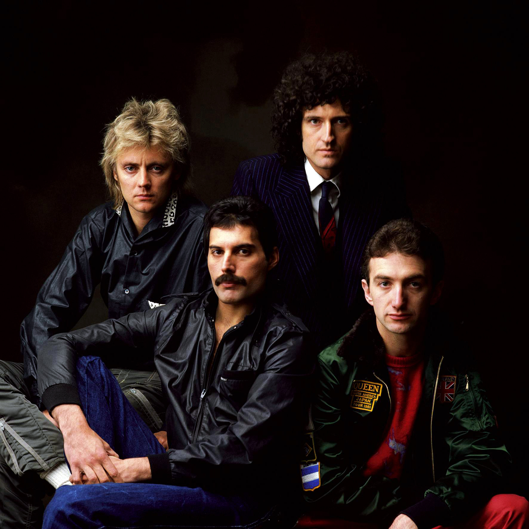 Who are the members of Queen and who took over from Freddie